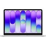 Modern laptop displaying colourful abstract gradient wallpaper