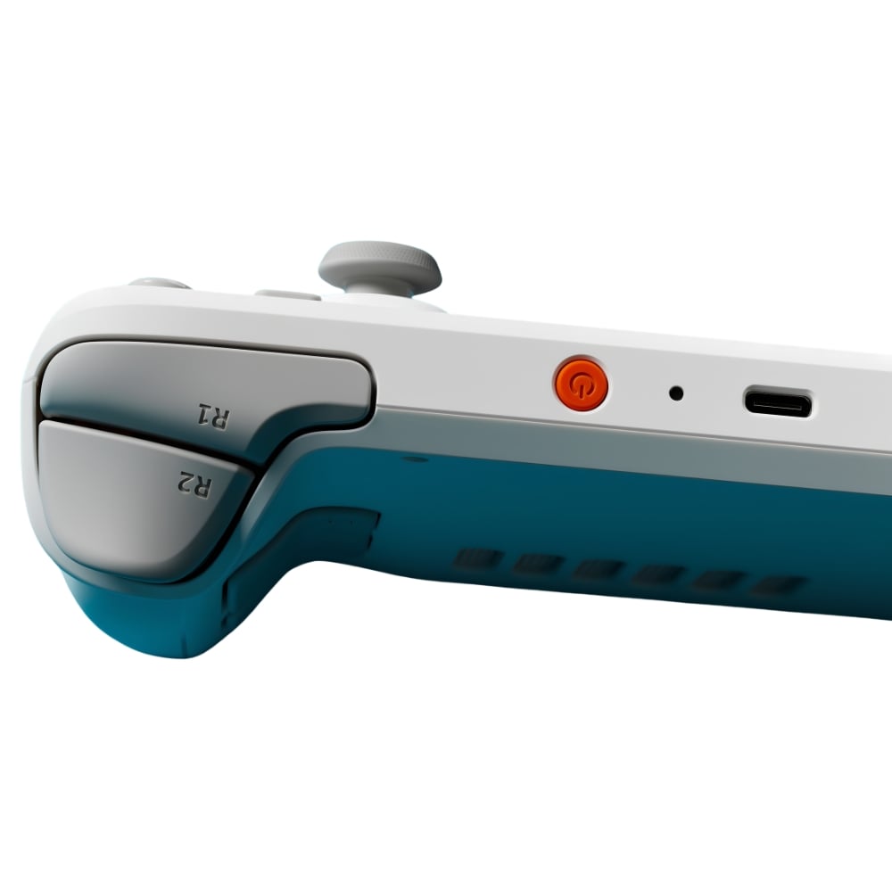 Close-up of game controller top buttons and port